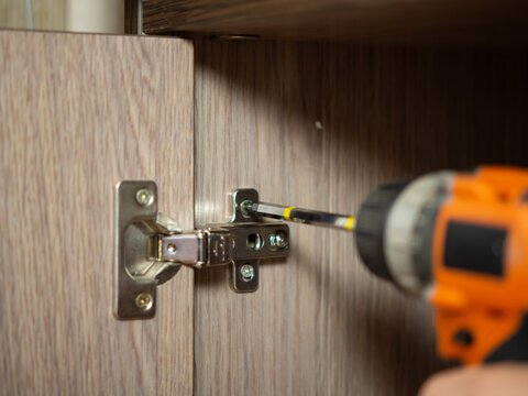 Cupboard hinge service (up to two)/30 mins